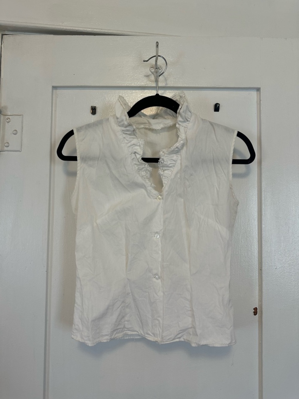 White Ruffled Sleeveless Button-Front Top